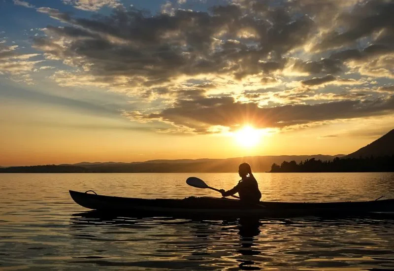 Sunset boat ride on Chapora River near morjim resort goa