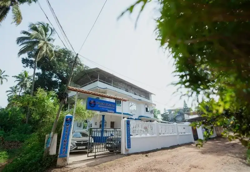 Entrance of resort property at resorts near Morjim Beach
